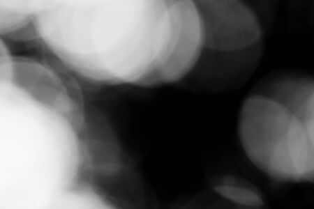 Black bokeh backgroundの写真素材