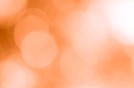Orange bokeh background from natureの写真素材