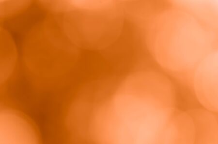 Orange bokeh background from natureの写真素材