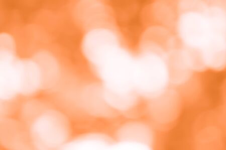 Orange bokeh background from natureの写真素材