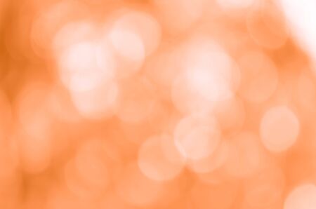 Orange bokeh background from natureの写真素材