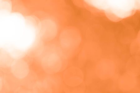 Abstract orange bokeh backgroundの写真素材