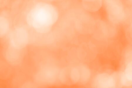 Abstract orange bokeh backgroundの写真素材