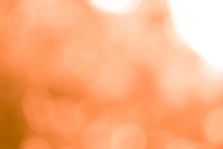 Abstract orange bokeh backgroundの写真素材