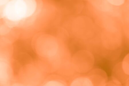 Abstract orange bokeh backgroundの写真素材
