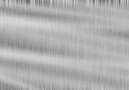 Metal background or texture of brushed steel plate with reflectionの写真素材