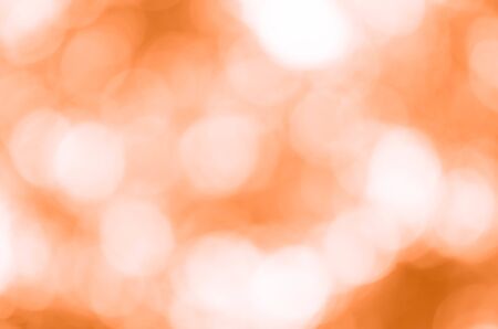 Orange bokeh background from natureの写真素材