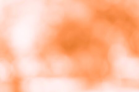 Orange bokeh background from natureの写真素材