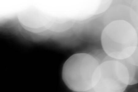 blurred bokeh lights on black loop backgroundの写真素材