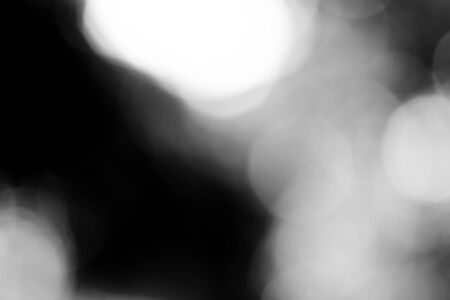 blurred bokeh lights on black loop backgroundの写真素材