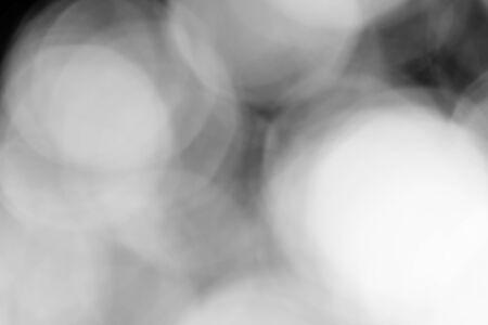 Abstract black bokeh backgroundの写真素材