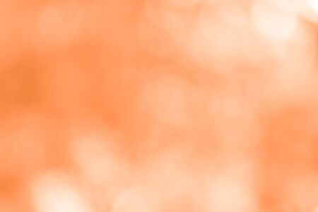 Abstract orange bokeh backgroundの写真素材