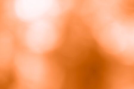 Orange bokeh background from natureの写真素材