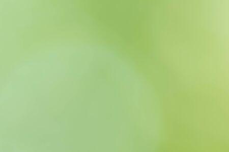 Abstract circular green bokeh backgroundの写真素材