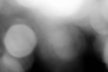 Abstract black bokeh backgroundの写真素材