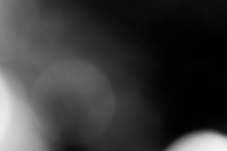 Black bokeh backgroundの写真素材