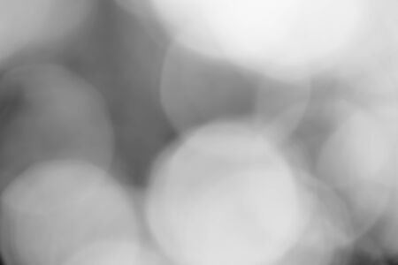 Black bokeh backgroundの写真素材