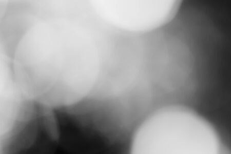 Black bokeh backgroundの写真素材