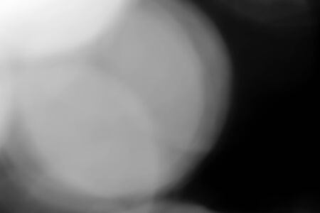 Black bokeh backgroundの写真素材