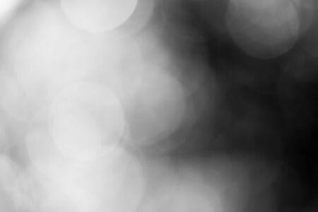 Black bokeh backgroundの写真素材