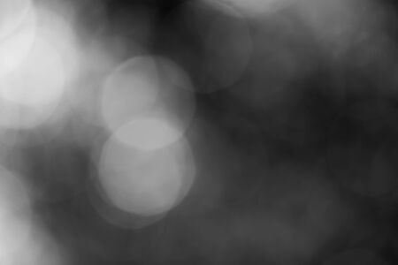 Black bokeh backgroundの写真素材
