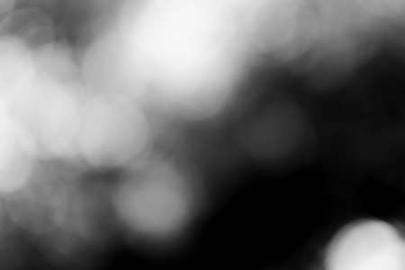 Abstract black bokeh backgroundの写真素材