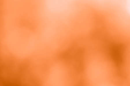 Orange bokeh background from natureの写真素材