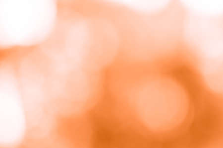 Orange bokeh background from natureの写真素材