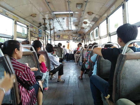 BANGKOK, THAILAND - Oct,25 2019: Perspective inside the open-air public bus No.136, the bus transportation route in Bangkok. Street photography of Thailandのeditorial素材