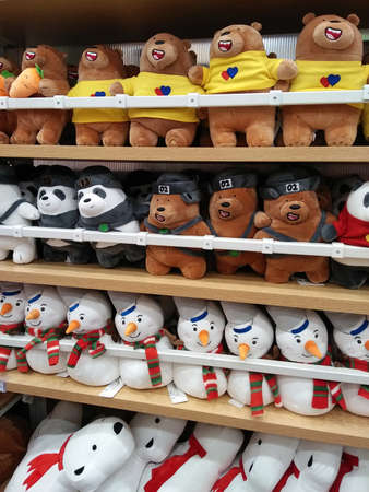 BANGKOK, THAILAND - Feb,10 2020: Cute animal dolls/toys on orderly store shelves in "Miniso" gift shop backgroundのeditorial素材