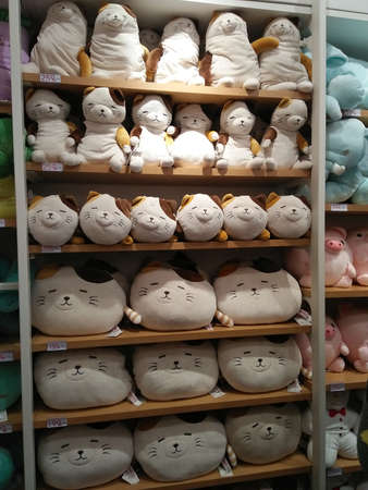 BANGKOK, THAILAND - Feb,10 2020: Cute animal dolls/toys on orderly store shelves in "Miniso" gift shop backgroundのeditorial素材