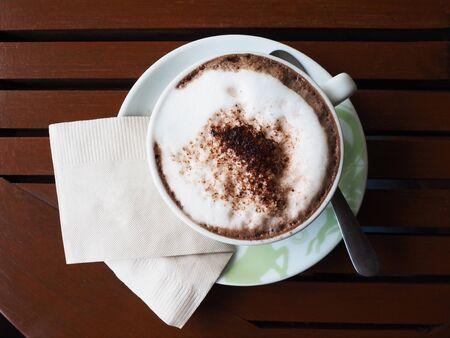 Hot chocolate with table background