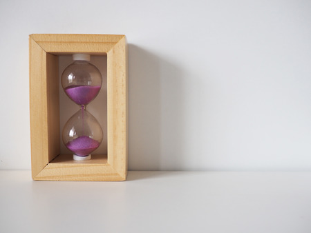 Sand glass with white backgroundの写真素材