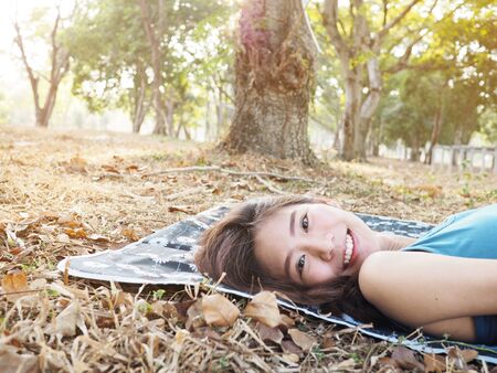 Woman smile in the gardenの写真素材