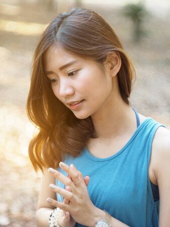 Woman standing in the parkの写真素材