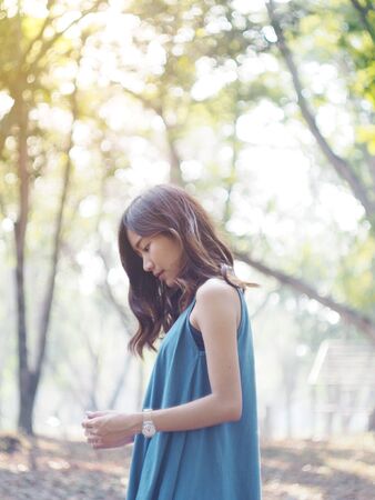 Woman standing in the parkの写真素材