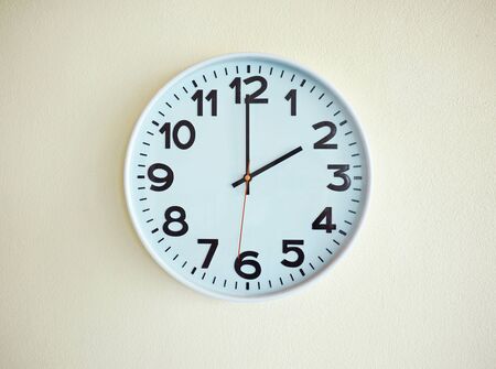 Clock on the wall for backgroundの写真素材