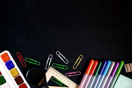 School supplies background on black color background. Place for textの写真素材