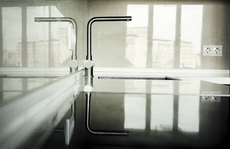 Modern kitchen in apartment, new housing conceptの写真素材
