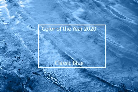 Abstract blue color water background in sun lightの写真素材