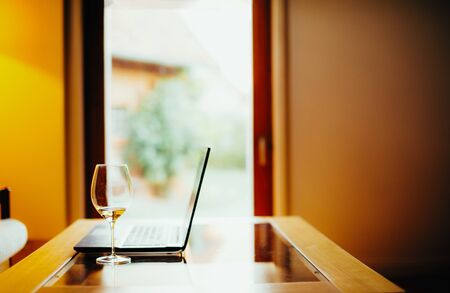 Workplace with notebook laptop, quarantined work from home, remote workの写真素材