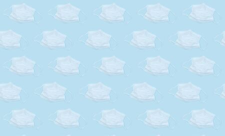 Pattern of medical mask flatlay on blue color background