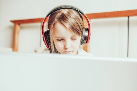 Online kid remote learning. Child studying from home. Homeschooling during quarantine and...