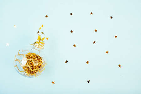 New Year bright ball and gold stars, Christmas background, new year concept 2021