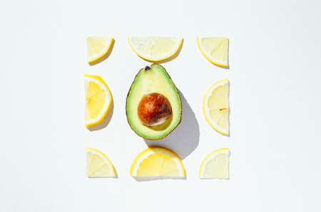 Lemon and avocado frame background, vegan and vegetarian concept