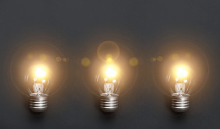 Light bulbs on gray ultimate color backgroundの写真素材