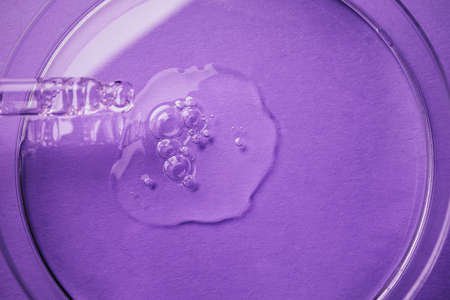 Pitte close-up on a purple background. Skin care products and natural cosmetics. beauty concept face and body careの写真素材