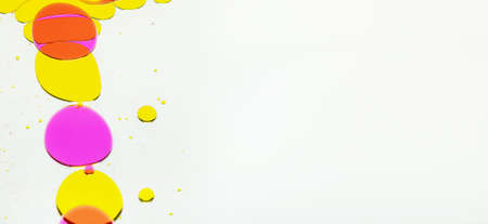 Colored circles oil on a white backgroundの写真素材