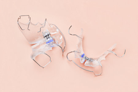 Retainer healthcare medical teeth mouth on blue backgroundの写真素材