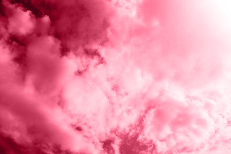 Summer magenta color sky and clouds natural backgroundの写真素材